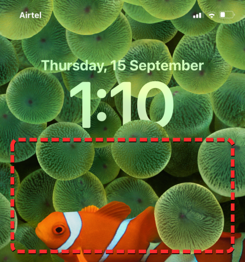 How to show the time under the lock screen wallpaper on iPhone